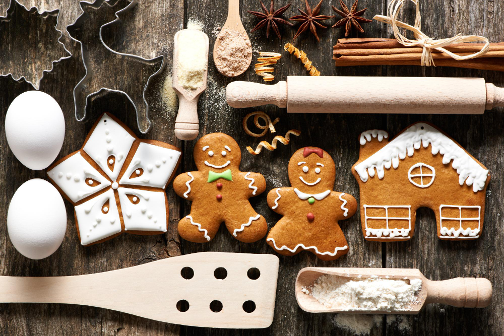 Rolling pin, piping bags, and cookie cutters for making a gingerbread house.