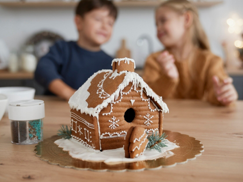 Rustic gingerbread house with minimal decorations.